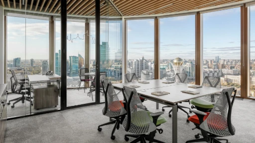 Herman Miller Sayl Chairs with table placed in Office