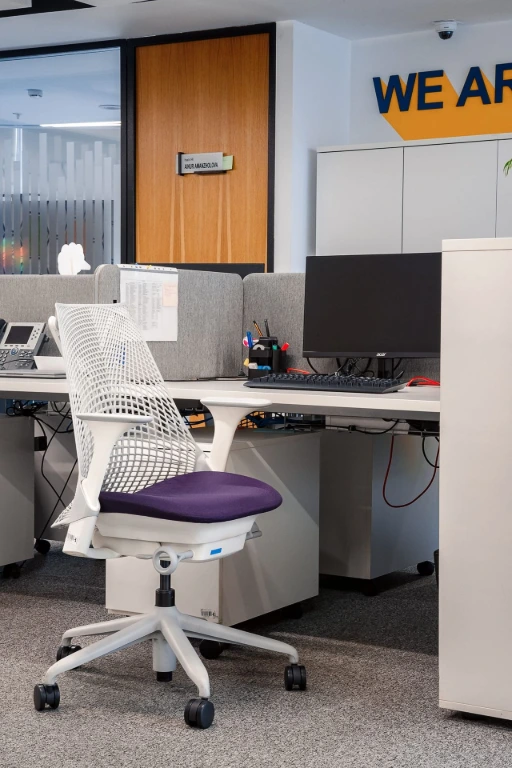 Herman Miller Sayl Chair with purple upholstered seat