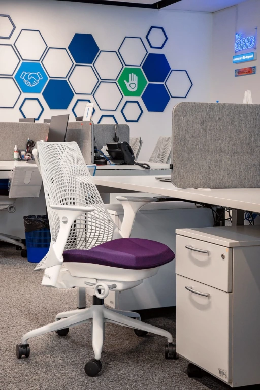 Herman Miller Sayl Chair with purple upholstered seat