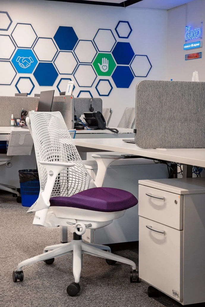 Herman Miller Sayl task chairs in corporate workstation — brand-aligned office design Almaty KZ