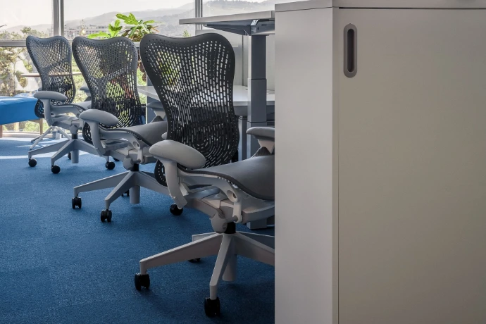 Herman Miller Mirra 2 chairs — technology compliance team workstations, payment corporation Almaty