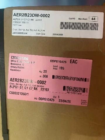 Close-up of the order label on a Herman Miller box showing the customer order number, model number and order and receipt dates