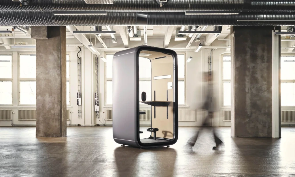 Framery office pod providing an enclosed space for calls in a shared workplace