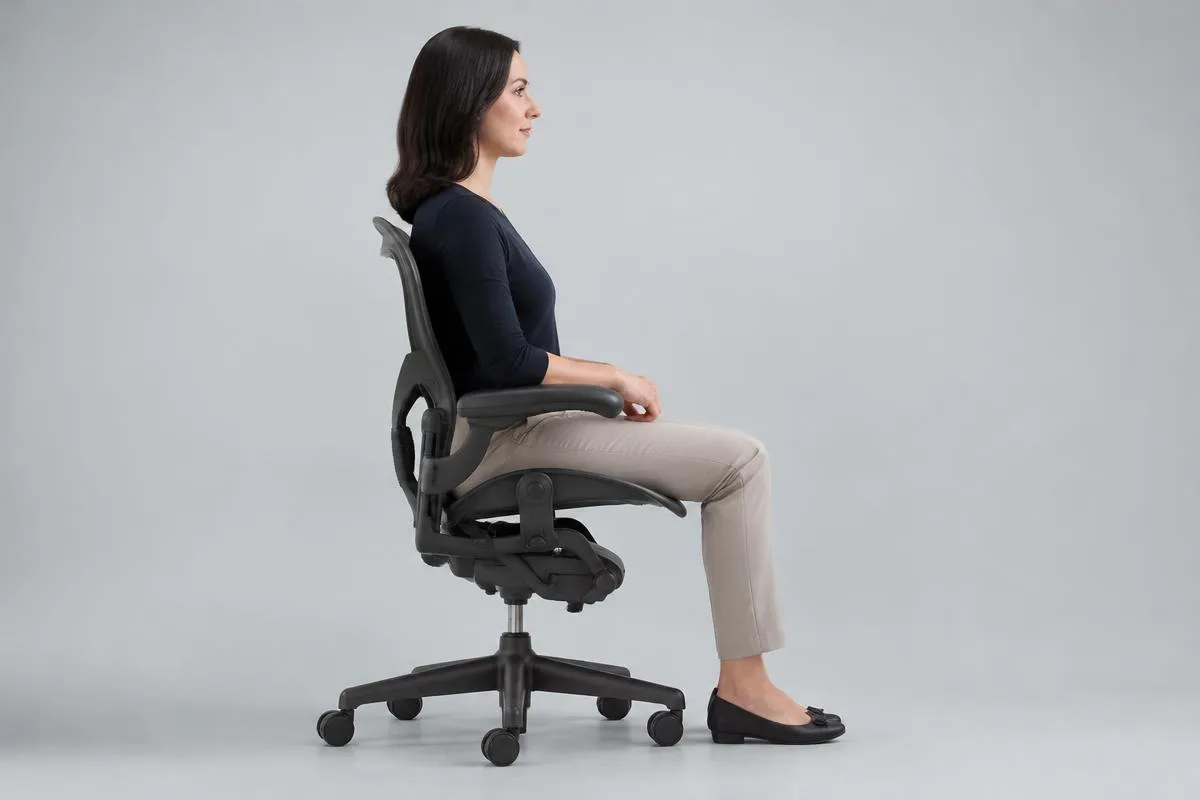 Setting seat height Person seated with feet flat on the floor and knees at a right angle after adjusting seat height